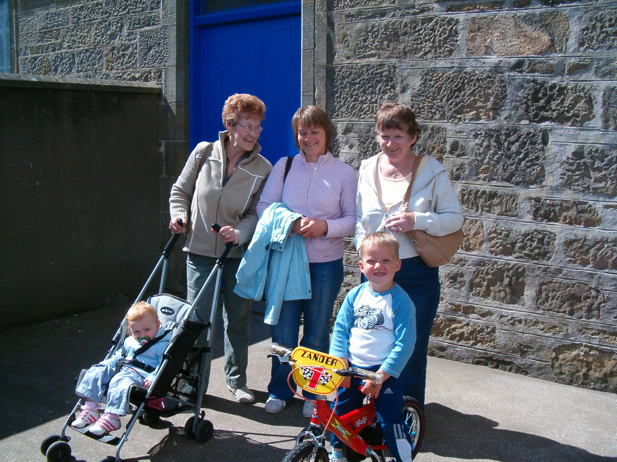 2008 - Jessie Bruce, Janice Craib & Helen McPherson with David & Alexander Craib outside church playschool.
